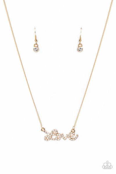 Head Over Heels in Love Gold Necklace-Jewelry-Paparazzi Accessories-Ericka C Wise, $5 Jewelry Paparazzi accessories jewelry ericka champion wise elite consultant life of the party fashion fix lead and nickel free florida palm bay melbourne